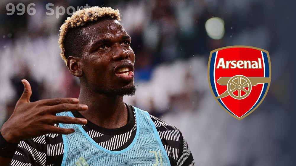 F365-Paul-Pogba-with-Arsenal-badge.jpg